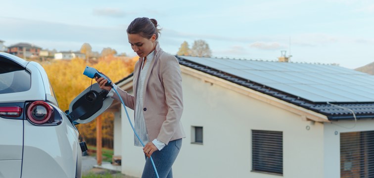 Women charges EV with home EV Chargers, Australia